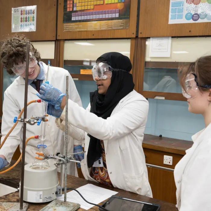 three pupils in science class - Nov 23