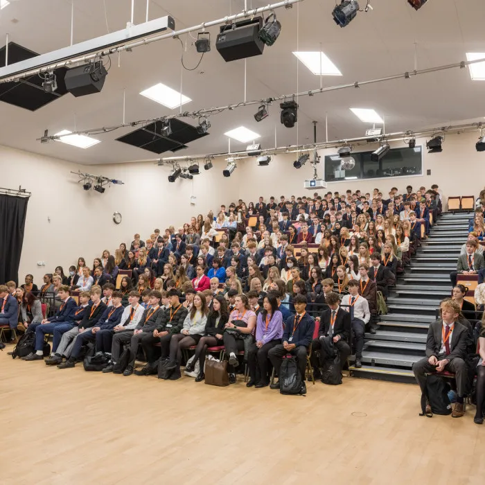 8_theatre full of students with teacher