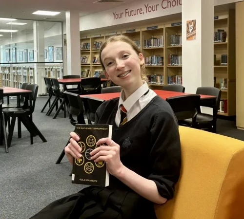 Pupil with book